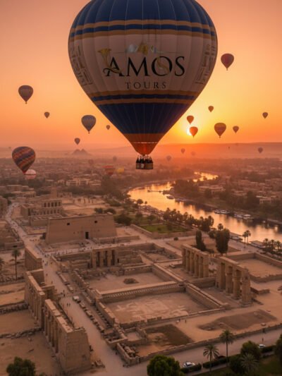 Sunrise hot air balloon over Thebes